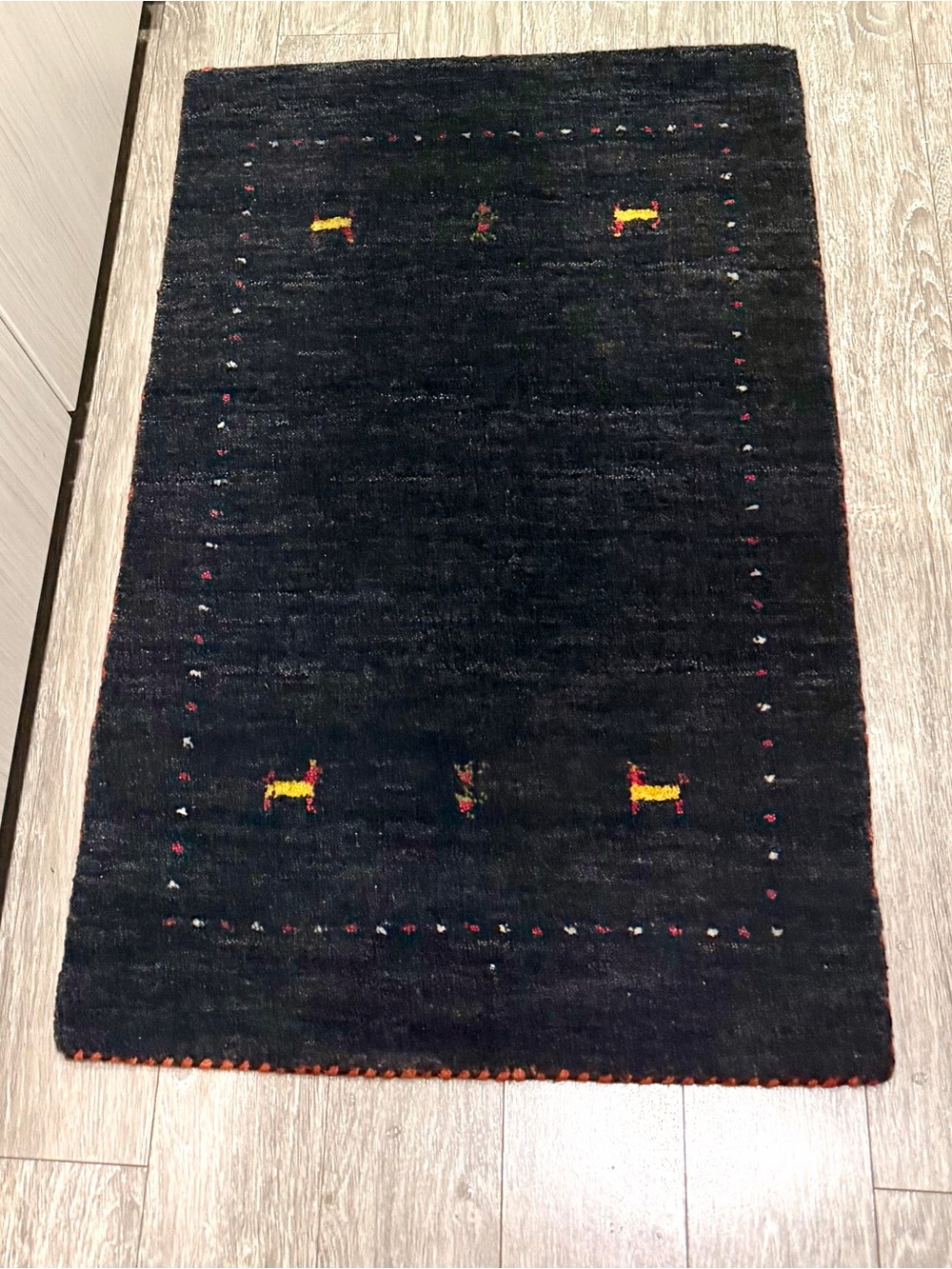 Dark Navy Area Rug with Colorful Accent Motifs